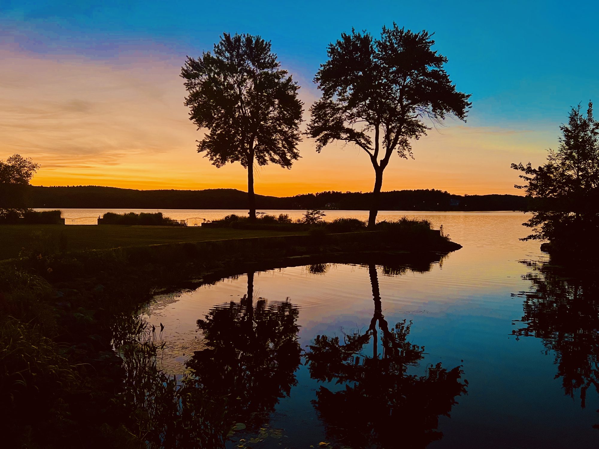 Sunset over the cove at Round Cove Farm